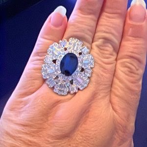 Adjustable fantasy ring with a blue stone